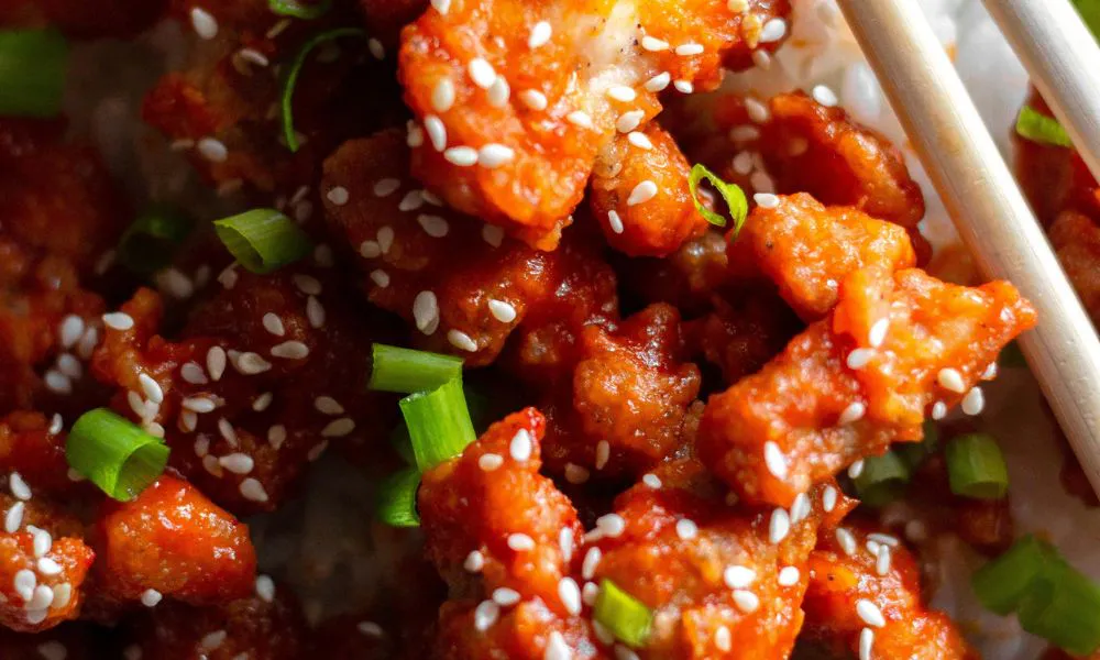 Crispy orange chicken glazed with sweet sauce, sesame seeds, and green onions at The Imperial Treasure, a Chinese restaurant in Matthews